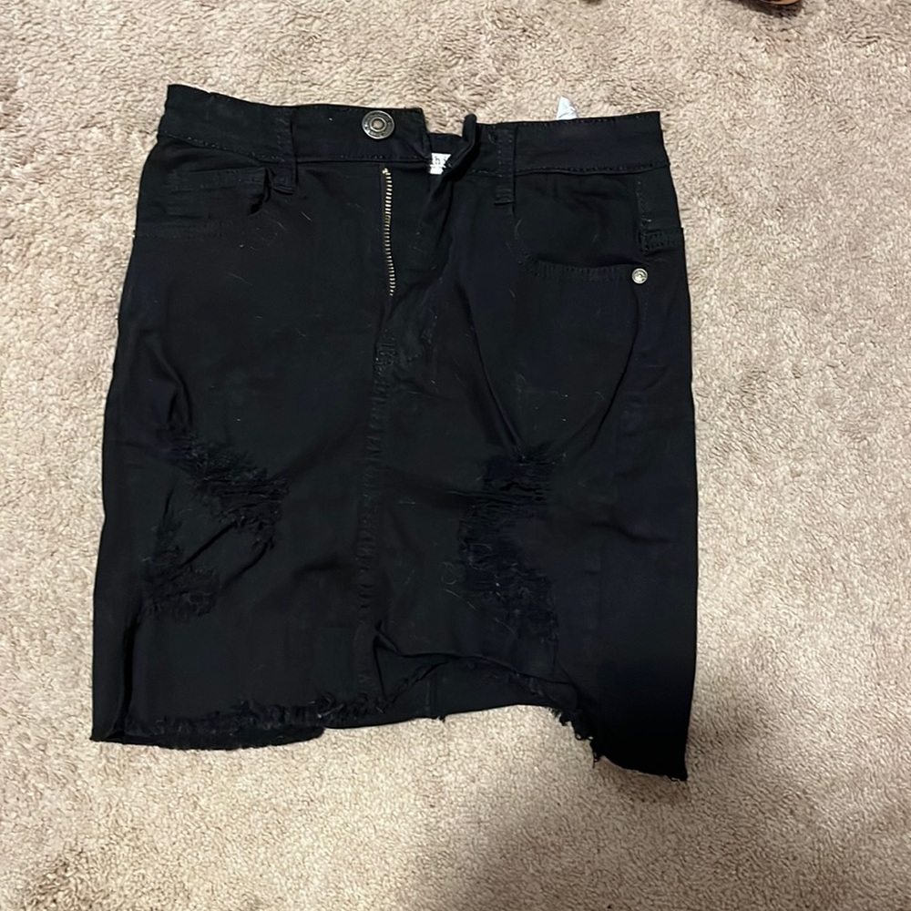 Black distressed denim skirt